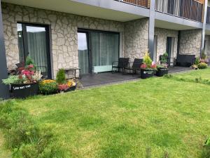 Vonkajšia záhrada v ubytovaní Apartamenty Kalina z widokiem na góry - Kilińskiego