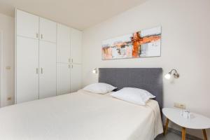 Postel nebo postele na pokoji v ubytování Apartments Pivas