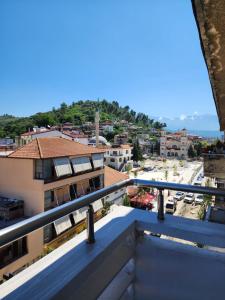 a view of a city from a balcony at Noel City Centre Apartment in Berat