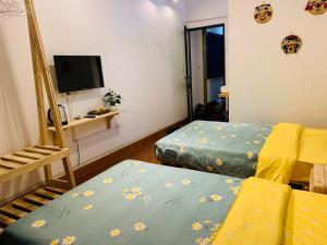 Postel nebo postele na pokoji v ubytování Sunny Hanoi Homestay