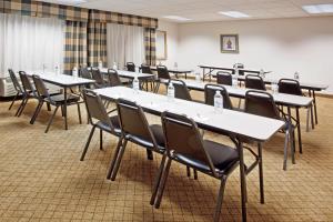 a room with rows of tables and chairs at Holiday Inn Express & Suites Alliance, an IHG Hotel in Alliance