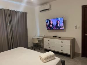 TV a/nebo společenská místnost v ubytování SOHA SUITES II