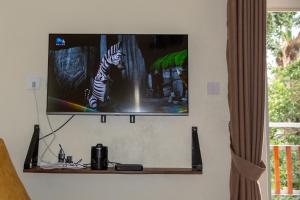 TV a/nebo společenská místnost v ubytování Dutchess Hotel and Restaurant
