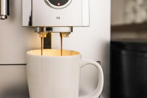 パルチーネスにあるResidence Kronenwirtのコーヒーメーカーが備わります。