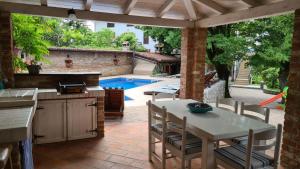 Patio nebo venkovní prostory v ubytování Villa Amalia Apartments