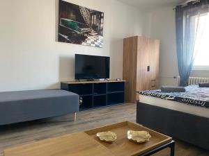 Postel nebo postele na pokoji v ubytování Černá Růže - Apartmán 4