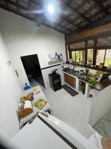 Dapur atau dapur kecil di Quarto Quintal da Prainha