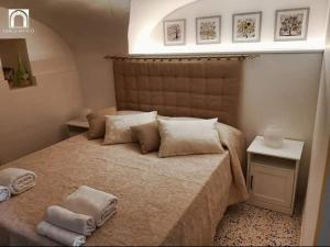 Кровать или кровати в номере Arco Antico