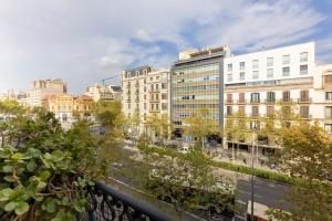 a view of a city with buildings and trees at Lodging Apartments Paseo de Gracia in Barcelona