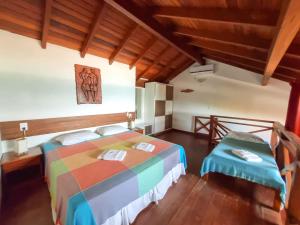 Cama ou camas em um quarto em Apart Hotel Beira do Mar