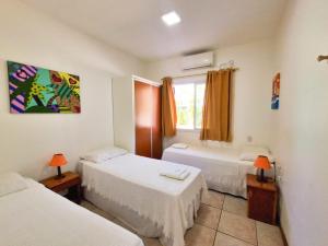 Cama ou camas em um quarto em Apart Hotel Beira do Mar