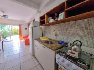 A cozinha ou cozinha compacta de Apart Hotel Beira do Mar