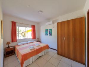 Cama ou camas em um quarto em Apart Hotel Beira do Mar