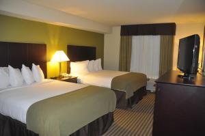 Postel nebo postele na pokoji v ubytování Holiday Inn Express & Suites Sarasota East by IHG