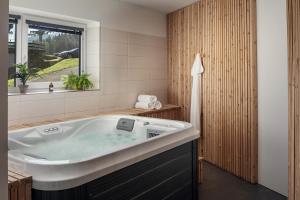 Koupelna v ubytování Ski & Spa hotel BELLEVUE