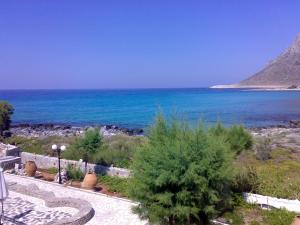 a view of the ocean from a resort at Blue Beach Villas Apartments in Stavros