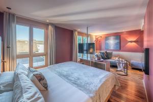 Posteľ alebo postele v izbe v ubytovaní hirschen dornbirn - das boutiquestyle hotel - skyrelax & wellness im rooftop