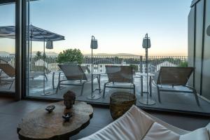 Posedenie v ubytovaní hirschen dornbirn - das boutiquestyle hotel - skyrelax & wellness im rooftop