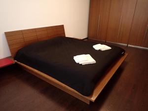 Ένα ή περισσότερα κρεβάτια σε δωμάτιο στο Marguerite apartment - parking including