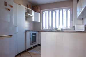 Köök või kööginurk majutusasutuses Tamarin Seaside Apartment