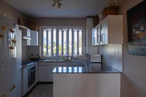 Köök või kööginurk majutusasutuses Tamarin Seaside Apartment