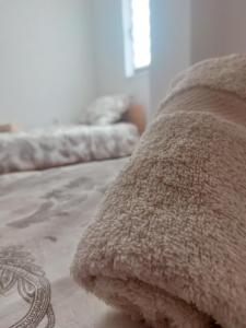 Ένα ή περισσότερα κρεβάτια σε δωμάτιο στο Apartmani Drmanic +2 φωτογραφίες