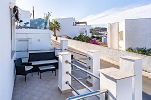 Uma varanda ou terraço em Apartamentos Dulcemar Frente al Mar con zona SPA