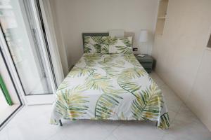 Postel nebo postele na pokoji v ubytování AriadiMare