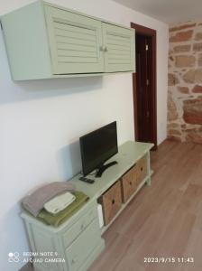 TV a/nebo společenská místnost v ubytování Casa Ana