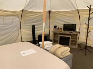 Postel nebo postele na pokoji v ubytování HG Glamping