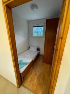 Postel nebo postele na pokoji v ubytování Najd apartment