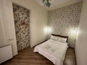 Postel nebo postele na pokoji v ubytování City Center Flamingo Suite