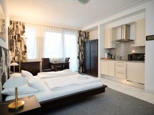 Η κουζίνα ή μικρή κουζίνα στο La Scala Apartments