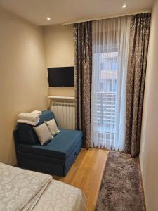 Ένα ή περισσότερα κρεβάτια σε δωμάτιο στο Apartman Andjela Zlatibor