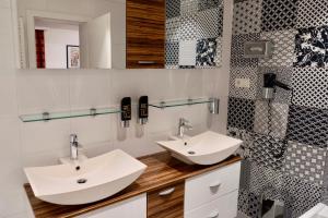 A bathroom at La Scala Apartments