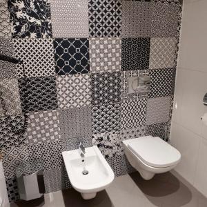A bathroom at La Scala Apartments
