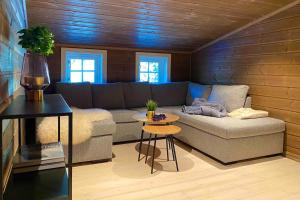 Posezení v ubytování Toppmoderne hytte i Beito