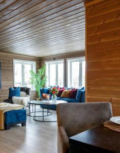 Posezení v ubytování Toppmoderne hytte i Beito