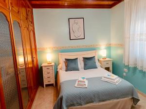 Postel nebo postele na pokoji v ubytování Villa Playa Portomayor BUEU