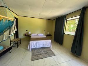 Voodi või voodid majutusasutuse Hotel Azul Coral toas