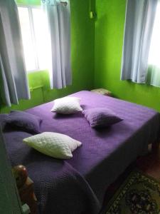 Een bed of bedden in een kamer bij La Coronilla ,Casa de Campo