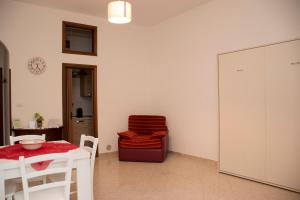 Et opholdsområde på Locorotondo Home Holidays + 25 billeder