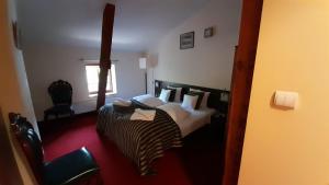 Posteľ alebo postele v izbe v ubytovaní Hotel Spichrz