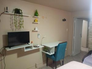 TV a/nebo společenská místnost v ubytování Pousada da Alê