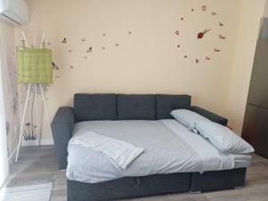 Un pat sau paturi într-o cameră la Vv La Joya Del Mar Suites
