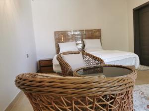 Postel nebo postele na pokoji v ubytování فيلا مسقط - Muscat Villa + 16 fotografií