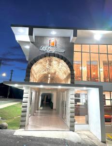 a entrance to a building with a tunnel at Hotel El Guajataca in Quebradillas