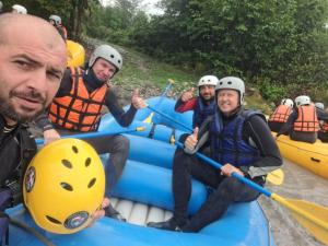 a group of people on a raft on a river at Panorama in Kutaisi