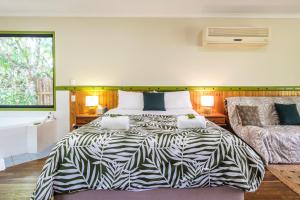 Ένα ή περισσότερα κρεβάτια σε δωμάτιο στο Getaways at Byfield