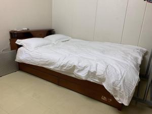 Postel nebo postele na pokoji v ubytování 风宿之所民宿